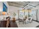 Dining room features exposed ductwork, lots of natural light, and dark wood floors at 206 Ne 11Th Ne St # 703A, Atlanta, GA 30309