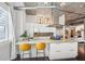 Bright modern kitchen features white cabinets, stainless appliances, and a large island with seating at 206 Ne 11Th Ne St # 703A, Atlanta, GA 30309