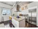 Kitchen features an eat-in island with stainless steel appliances and barstool seating at 206 Ne 11Th Ne St # 703A, Atlanta, GA 30309