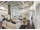 Spacious living room with a concrete pillar, modern furniture, and dark wood flooring at 206 Ne 11Th Ne St # 703A, Atlanta, GA 30309