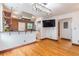 Open layout kitchen and living space with a mounted television at 36 Daniel Se St # 5, Atlanta, GA 30312