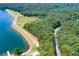 Scenic aerial view of waterfront property and wooded landscape with lake access for recreation and natural beauty at 8088 Lakeview Pkwy, Villa Rica, GA 30180