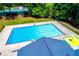 The community pool is an in-ground pool with fencing and a diving board at 8088 Lakeview Pkwy, Villa Rica, GA 30180