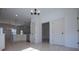 Open concept living and dining area adjacent to modern kitchen at 8088 Lakeview Pkwy, Villa Rica, GA 30180