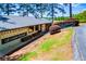 Charming marina restaurant with outdoor seating and lush landscaping at 8088 Lakeview Pkwy, Villa Rica, GA 30180