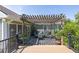 Inviting backyard deck with a pergola, offering an ideal space for outdoor gatherings at 1490 Twin Manor Dr, Loganville, GA 30052