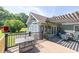 Spacious deck with outdoor seating, offering a perfect spot to enjoy the backyard view at 1490 Twin Manor Dr, Loganville, GA 30052