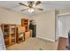 Bright bedroom with natural light, carpet, ceiling fan, and furnishings at 1490 Twin Manor Dr, Loganville, GA 30052