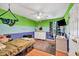 Vibrant bedroom with unique wall design, ceiling fan and natural light at 1490 Twin Manor Dr, Loganville, GA 30052