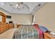 Spacious main bedroom featuring a coffered ceiling and dresser at 1490 Twin Manor Dr, Loganville, GA 30052