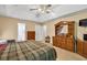 Spacious main bedroom featuring a coffered ceiling and large windows at 1490 Twin Manor Dr, Loganville, GA 30052