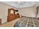 Spacious main bedroom featuring a coffered ceiling and dresser at 1490 Twin Manor Dr, Loganville, GA 30052