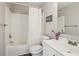 Cozy bathroom with a shower-tub combo and a neutral-toned vanity with a mirror at 2058 Drogheda Ln, Marietta, GA 30066