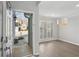 Bright entryway featuring hardwood floors, white trim, a view of the front yard, and plenty of natural light at 2058 Drogheda Ln, Marietta, GA 30066
