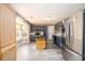 Bright kitchen featuring stainless steel appliances, an island, and plenty of natural light, ready for entertaining at 3730 Warriors Path, Decatur, GA 30034