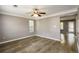 Bright living room with neutral walls, white trim, updated floors, and ample natural light through the windows at 3730 Warriors Path, Decatur, GA 30034