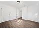 Bright bedroom features modern flooring, neutral paint, and ample natural light at 5155 Oakdale Ct, Douglasville, GA 30135