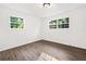 Neutral bedroom with wood-look floors and lots of natural light at 5155 Oakdale Ct, Douglasville, GA 30135