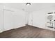 Modern bedroom offers wood-look floors, neutral paint and an attached bathroom at 5155 Oakdale Ct, Douglasville, GA 30135