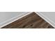 Detailed view of the new wood flooring and trim at 5155 Oakdale Ct, Douglasville, GA 30135
