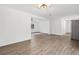 Bright and open living area showcasing new floors, and freshly painted walls at 5155 Oakdale Ct, Douglasville, GA 30135