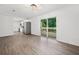 Open-concept living room featuring lots of natural light and kitchen views at 5155 Oakdale Ct, Douglasville, GA 30135