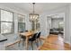 Dining area adjacent to kitchen featuring hardwood floors and lots of light at 571 Morgan Ne St, Atlanta, GA 30308