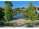 Serene outdoor view featuring a scenic pond with a fountain in a park-like setting at 571 Morgan Ne St, Atlanta, GA 30308