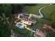 Stunning aerial view of the estate showcasing the home, pool, gardens, and expansive grounds at 7255 Old Rico Rd, Chattahoochee Hills, GA 30268