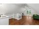 Bright bonus room with hardwood floors, kitchenette, and walkout at 7255 Old Rico Rd, Chattahoochee Hills, GA 30268