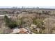 Wide aerial shot displaying homes, trees, and the Atlanta skyline in the background on a sunny day at 1466 University Dr, Atlanta, GA 30306
