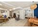Basement living room, dining nook, and partial view of bedroom beyond at 1466 University Dr, Atlanta, GA 30306
