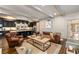 Cozy living room with comfortable leather seating, an open floor plan, and stylish decor and finishes at 1466 University Dr, Atlanta, GA 30306