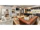 Open-concept living room with stylish decor connecting the living area and the kitchen and island at 1466 University Dr, Atlanta, GA 30306