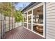 View of a screened porch featuring outdoor seating and view of the patio at 1466 University Dr, Atlanta, GA 30306
