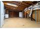 Unfinished basement offers laundry area and storage with exposed ductwork at 218 Woodview Se Ln, Smyrna, GA 30082