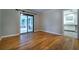 Spacious dining room features gleaming hardwood floors, access to a bright porch at 218 Woodview Se Ln, Smyrna, GA 30082