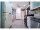 Open kitchen design with stainless steel appliances and plenty of storage space at 218 Woodview Se Ln, Smyrna, GA 30082