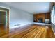 Spacious living room boasting hardwood floors, a wood-paneled fireplace and great light at 218 Woodview Se Ln, Smyrna, GA 30082