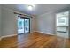 Inviting living room features hardwood floors and access to the sunroom at 218 Woodview Se Ln, Smyrna, GA 30082