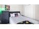Cozy bedroom featuring a large window and closet space at 2450 Mildon Hall Ln, Lawrenceville, GA 30043