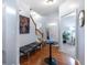 Elegant foyer with hardwood floors, stylish decor, and staircase leading to the upper level at 2450 Mildon Hall Ln, Lawrenceville, GA 30043