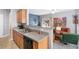 Open-concept kitchen with modern appliances, seamlessly connected to the living area, ideal for entertaining at 2450 Mildon Hall Ln, Lawrenceville, GA 30043
