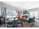 Spacious living room with fireplace, ample seating, and stylish decor perfect for entertaining at 2450 Mildon Hall Ln, Lawrenceville, GA 30043
