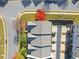 Overhead view of townhome roof and landscaping, with nearby street access at 2450 Mildon Hall Ln, Lawrenceville, GA 30043