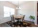 Bright dining area with a round table set and modern wainscoting at 103 Prominence Ct, Canton, GA 30114