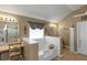 Bathroom featuring a large soaking tub, separate shower, and dual vanities at 1104 Stepping Stone Ln, Conyers, GA 30012