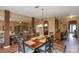 Formal dining room with chandelier lighting and open floor plan to the living room and entrance at 1104 Stepping Stone Ln, Conyers, GA 30012