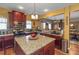 Stylish kitchen featuring granite countertops, stainless steel appliances, and decorative backsplash at 1104 Stepping Stone Ln, Conyers, GA 30012