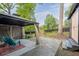 Relaxing backyard patio area with outdoor furniture and a peaceful garden view at 2382 Whites Mill Ln, Decatur, GA 30032